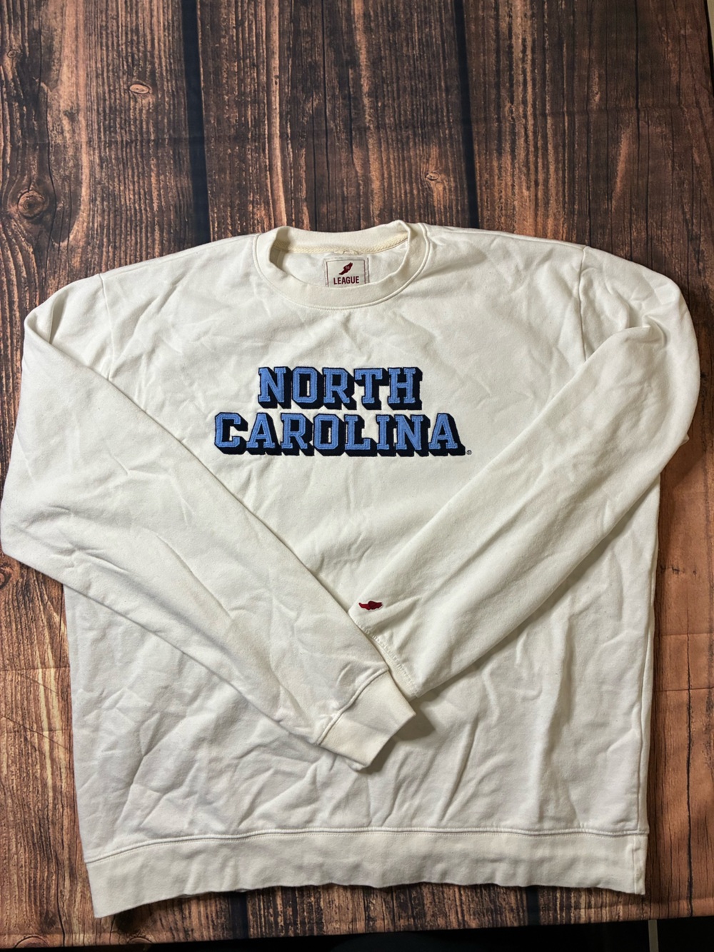 League Cream North Carolina Crewneck with Blue Appliqué